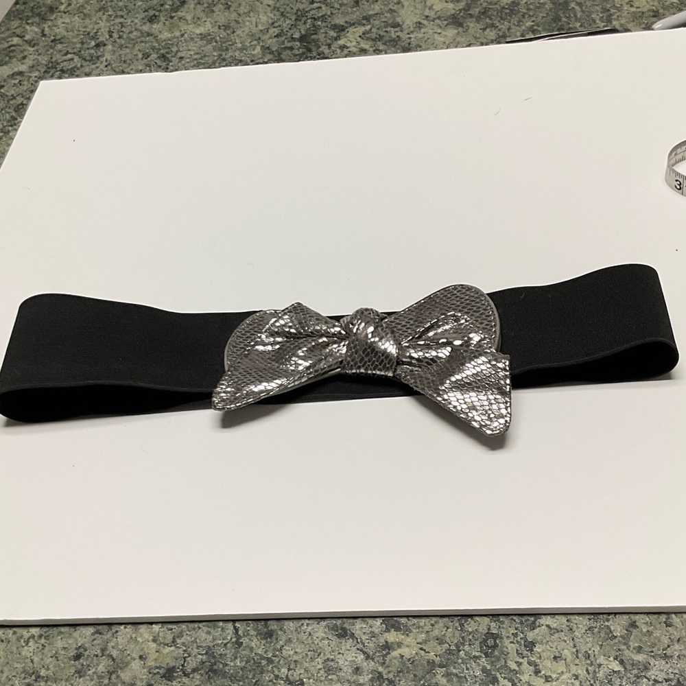 Vintage black belt with silver bow